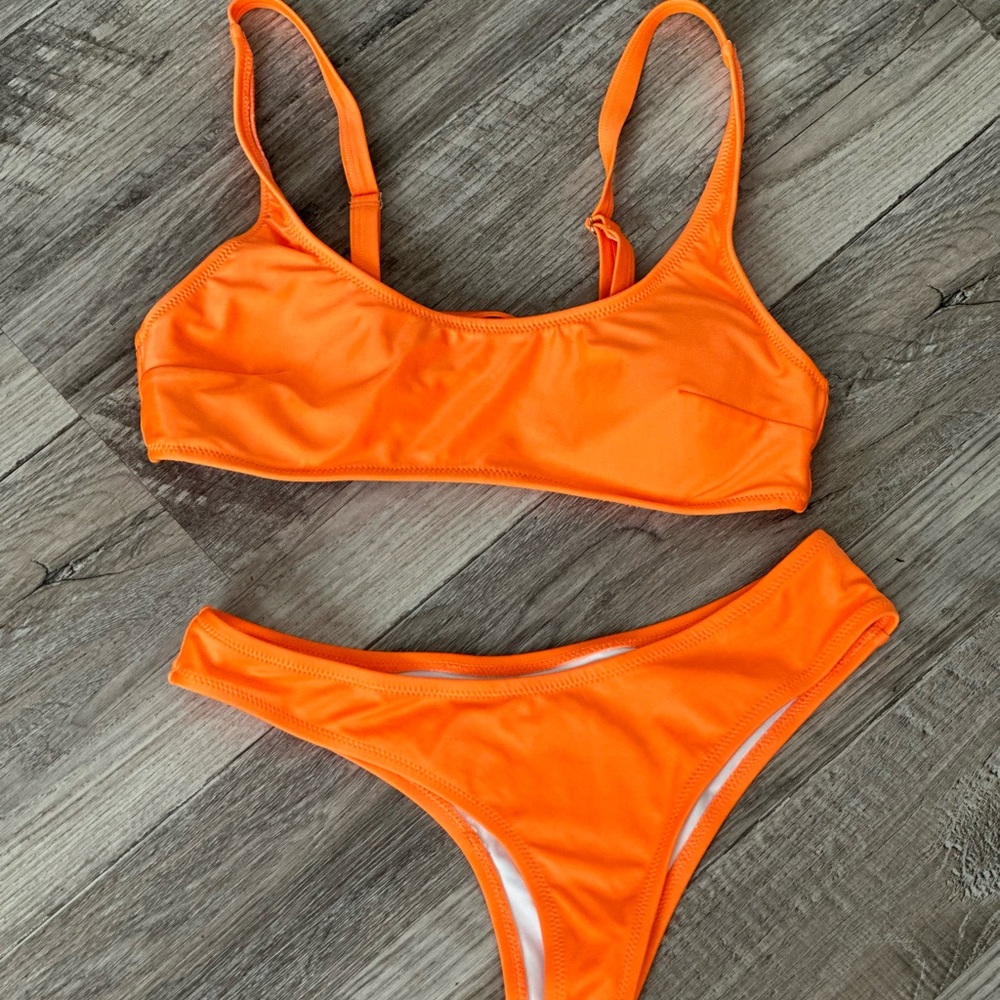 Orange bikini high cut bottoms top has adjustable straps